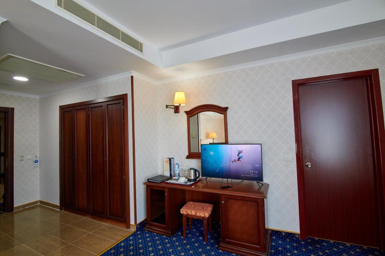 Grand Hotel Victory Aktau  Exterior photo A room at the hotel